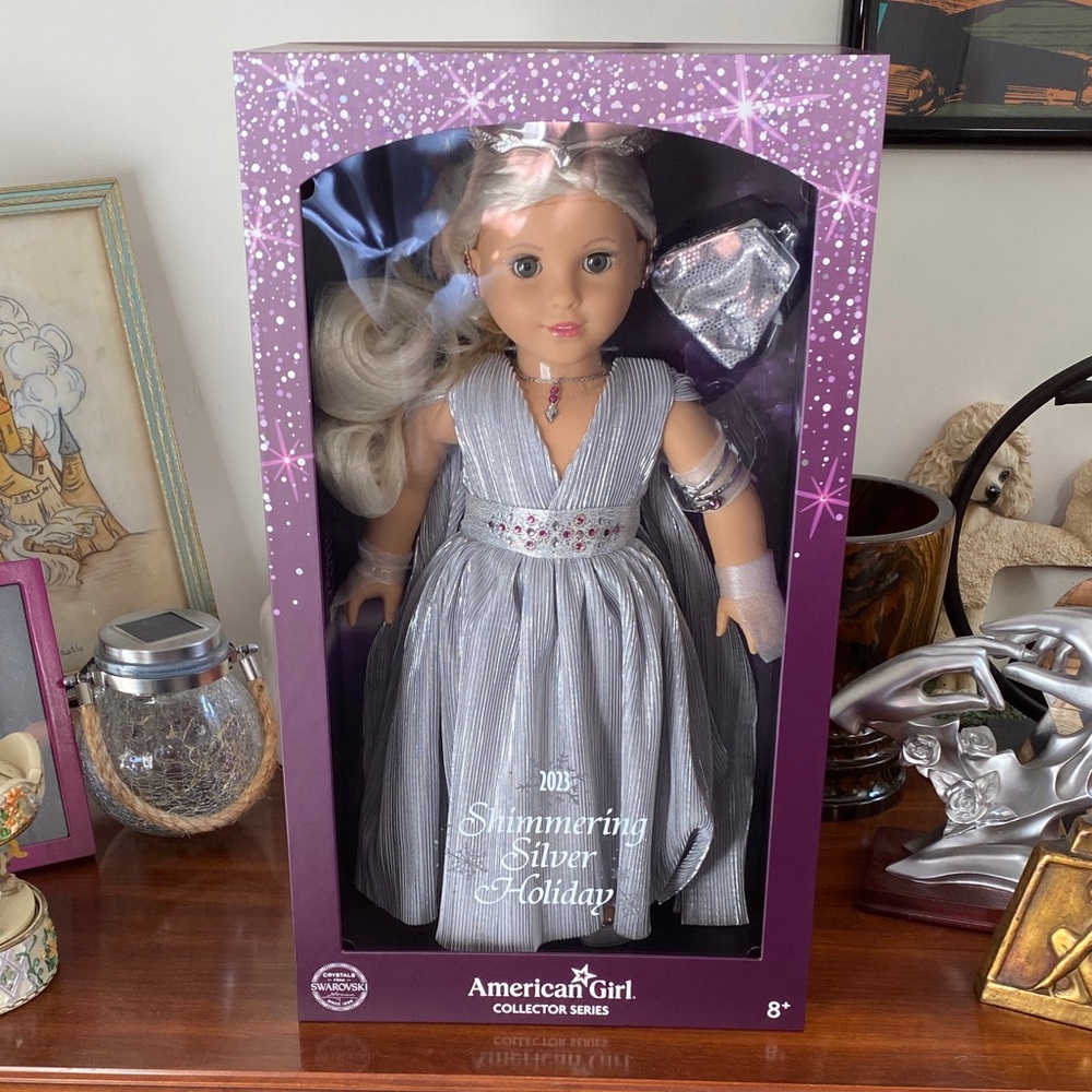 American Girl Shimmering Silver Doll with Purple Packaging
